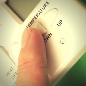 turn down the temperature to cut home heating bills