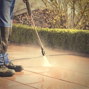 clean a stone deck with a pressure washer